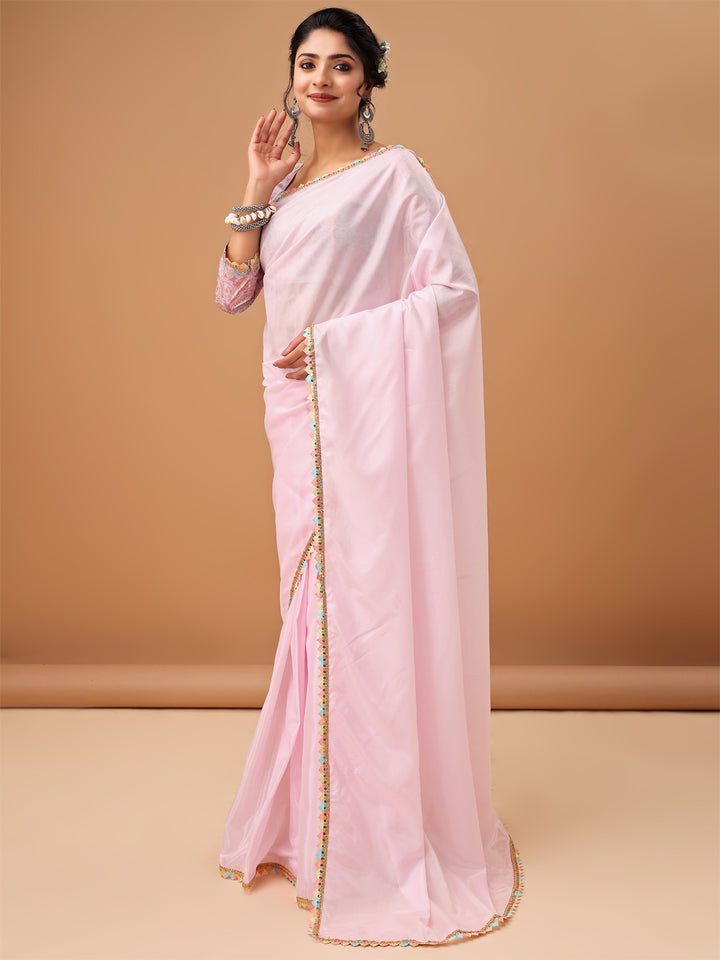 Elegant Pastel Pink Saree with Printed Blouse and Embroidered Clutch